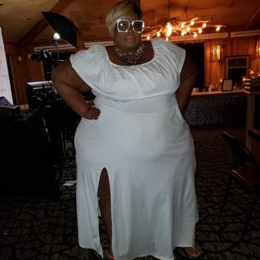 All white dress with high Split